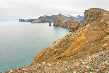 Deception Island close to the Antarctic Peninsula with  underlying active volcano.