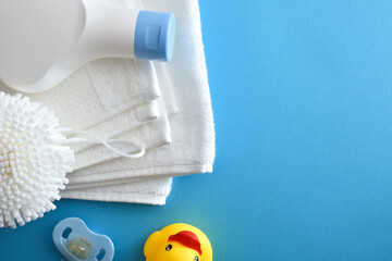 Bath set products for baby on blue table