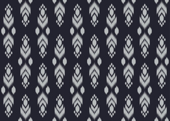 Ikat pattern on black background.White chevron pattern.Vertical pattern.Zigzag.Geometric shape.DIgital design.Ethnic.Illustration.Modern.Design for rug.Blanket.Carpet.Printing.Tablecloth.Knitted
