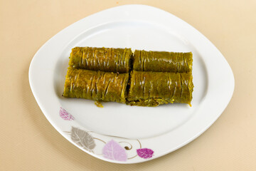Turkish Dessert Sobiyet  Baklava, mussels baklava and classic baklava with Pistachio . Cevizli, Fistikli Baklava, top view.