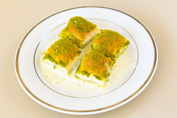 Turkish Dessert Sobiyet  Baklava, mussels baklava and classic baklava with Pistachio . Cevizli, Fistikli Baklava, top view.