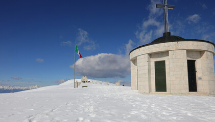 Pieve, TV, Italy - March 13, 2024: Military Ossuary Memorial of Monte Grappa with snow