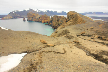 Deception Island close to the Antarctic Peninsula with  underlying active volcano.