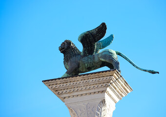 Venice, VE, Italy - February 13, 2024: Winged Lion symbol of the Serenissima Republic of Venice and the sky in Saint Mark Square