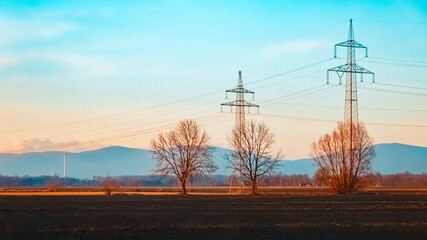 Evening view with overland high voltage lines and the sugar factory of Plattling seen from...