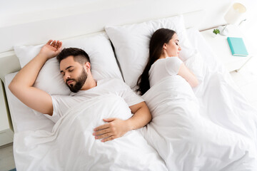 Photo of two people wife husband sleep in cozy bed in house indoors