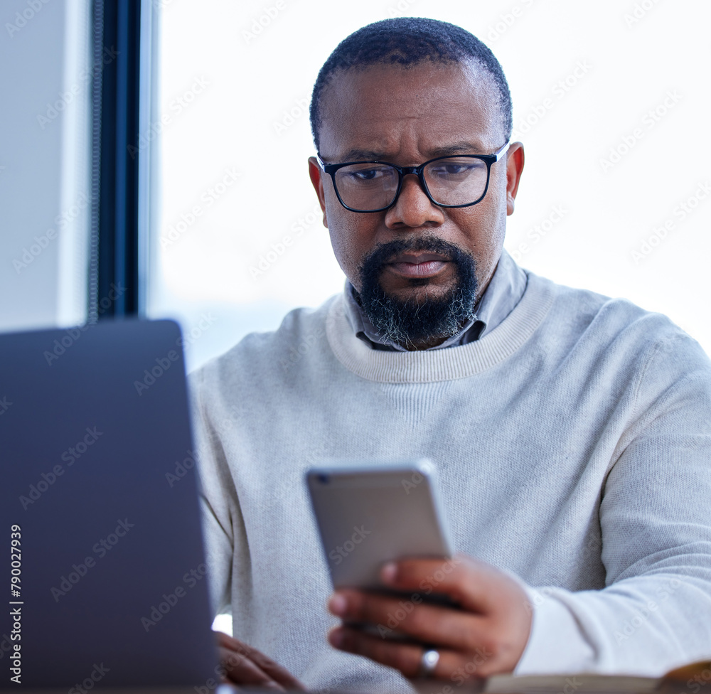 Poster Business, black man and smartphone or laptop in office for email, communication with internet for website development. Male coder or mobile and computer at work for job, cloud computing for software
