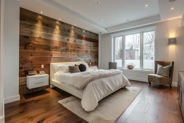 Fotobehang Sleek and modern bedroom with sleek white headboard, wooden floors, wall sconces for lighting, vibrant purple pillows on the bed, contemporary art piece above it, warm yellow walls © Kien