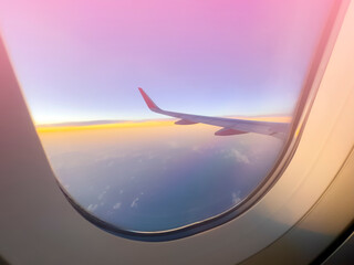Sunset sky from the airplane window -travel concept