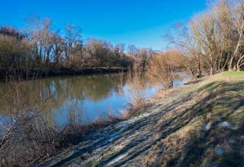 Morava river among autumn forests.