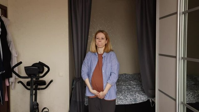 Pregnant woman suffers from incontinence, discomfort in pregnancy, pee urgency, toilet problem
