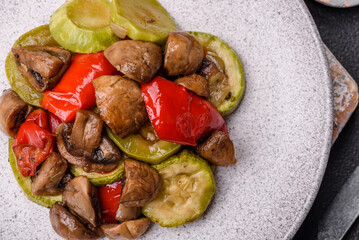 Delicious fresh grilled vegetables zucchini, bell peppers, mushrooms and onions