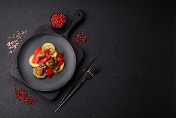 Delicious fresh grilled vegetables zucchini, bell peppers, mushrooms and onions