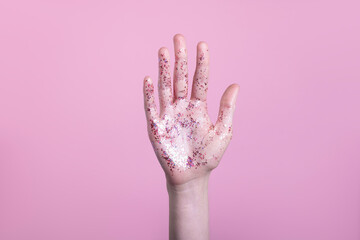 female palm in sparkles glitter isolated on pink background, hello party symbol