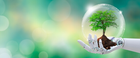 Growing tree in Robot hand with protection from crystal ball. Green background with bokeh. World mental health and World earth day. Artificial Intelligence, Saving environment and World Ecology Concep