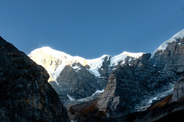 Snow capped mountains in himalaya landscape with rocks. Kailash mountain peak in Tibet.
