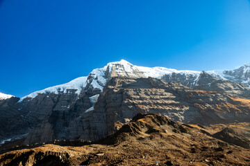 Snow capped mountains in himalaya landscape with rocks. Kailash mountain peak in Tibet.