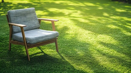 Outdoor armchair garden furniture on grass floor for relaxing on hot summer days