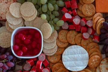 Platter of fruit, crackers, cheese and dip to share for celebration