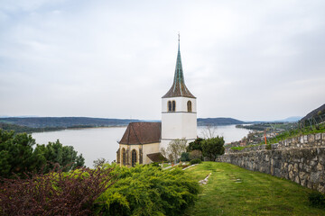 Fototapeta na wymiar Church Neuenburg Biel Ligerz Switzerland water wineyard mountains