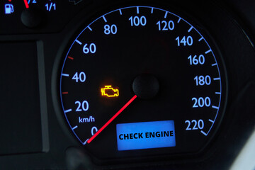Check engine error light illuminated on car dashboard