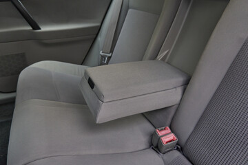 Car passenger back rear seats armrest in gray color