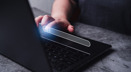 Woman using laptop with VR search bar interface. SEO Search Engine Optimization concept. Ranking...