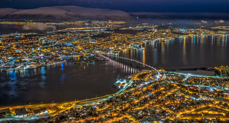 Bridge of city Tromso, Norway aerial photography. Tromso is considered the northernmost city in the...