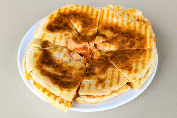 Turkish karisik atom  tost ( kasarli bazlama tost) . Sucuklu, Kasarli, kavurmali karisik tost. Flat...