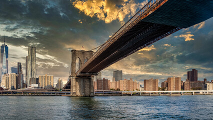 Brooklyn Bridge in New York City, NY. The Brooklyn Bridge is one of the oldest bridges in the...