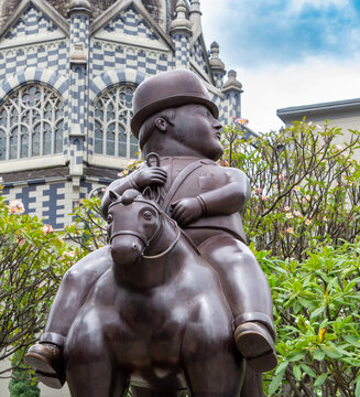 Medellin, Antioquia, Colombia : July 27 2023 : Botero Plaza (Botero square). Sculpture (caballero : rider) by Fernando Botero, a famous Colombian artist.
