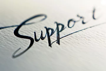 Foto op Plexiglas inspiring close-up photograph capturing the word "support" in calligraphy against a pristine white background, illustrating the beauty and elegance inherent in the act of offering © forenna