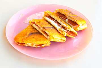 Turkish karisik atom  tost ( kasarli bazlama tost) . Sucuklu, Kasarli, kavurmali karisik tost. Flat baked bread toasted