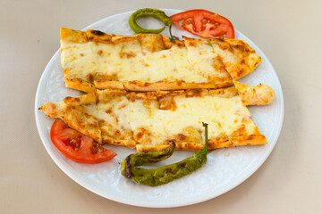 Kiymali pide. Turkish pide with minced meat. Turkish pizza mince pita Pide on white background. Etli ekmek. Kusbasi kasarli, kiymali kasarli, kiymali yumurtali, Bafra, Trabzon, Kusbasili pide.