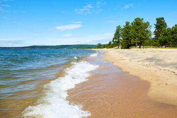 Beautiful sandy beach on a sunny summer day, seascape.