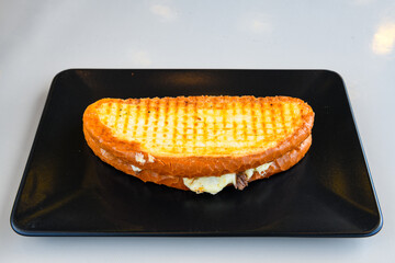 Turkish karisik atom  tost ( kasarli bazlama tost) . Sucuklu, Kasarli, kavurmali karisik tost. Flat...