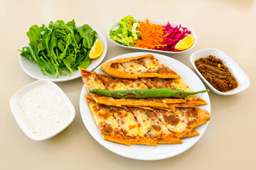 Kiymali pide. Turkish pide with minced meat. Turkish pizza mince pita Pide on white background. Etli ekmek. Kusbasi kasarli, kiymali kasarli, kiymali yumurtali, Bafra, Trabzon, Kusbasili pide.