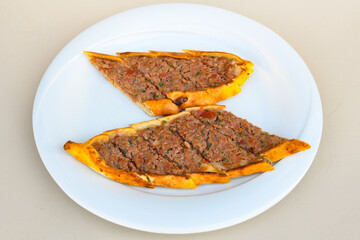 Kiymali pide. Turkish pide with minced meat. Turkish pizza mince pita Pide on white background. Etli ekmek. Kusbasi kasarli, kiymali kasarli, kiymali yumurtali, Bafra, Trabzon, Kusbasili pide.
