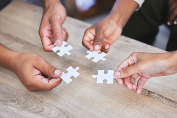 Puzzle, company and teamwork for collaboration, planning and partnership for hope and goals. Hands,...