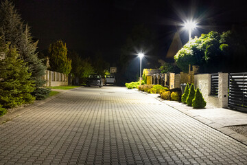 safety night street in residential area, modern street lights - 790111193
