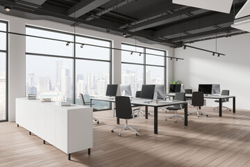 Modern office interior with desks, chairs, and computers, against a backdrop of cityscape view through large windows, concept of a business space. 3D Rendering