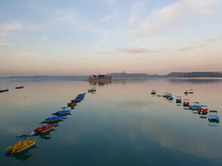 Fototapeta premium Fishing boats anchored on the lake shore