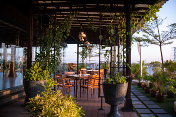 Chairs in the terrace house with green flowers around them. Relax and calm