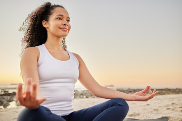 Woman, beach and smile with meditation for peace or zen, calm and wellbeing or wellness in Los Angeles. Female person, outdoor and mat for mental health, mindset and relaxation for stress relief. - obrazy, fototapety, plakaty