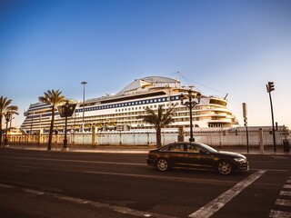 A large luxury cruise ship anchored in the harbor of Cadiz, Andalusia, Spain
