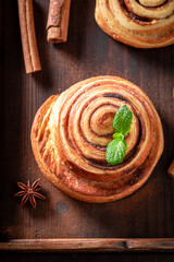 Hot and tasty cinnamon rolls with cinnamon and sugar.