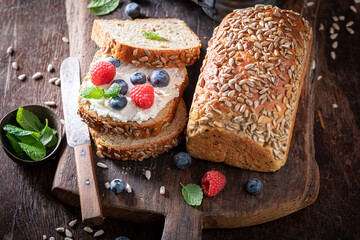 Sweet and healthy whole grain bread with raspberries and blueberries.