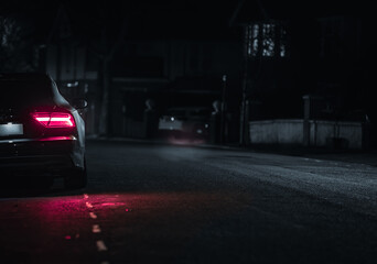 Modern vehicle rear, tail led light at night