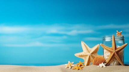 Fototapeta na wymiar starfishes and shell on the beach with light blue background