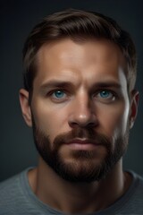 Obraz premium Hyper realistic portrait of 32 years old, handsome athletic man, short hair, natural skin, handsome face with beard, playful body, serious expression, blue eyes, moody background, natural skin. 